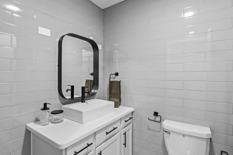 a glass wall with a reflection of some stairs